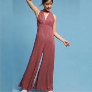 Bohemian jumpsuit with high collar.